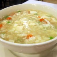 Seafood Bean Curd Soup · With crispy noodles. 