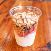 Perfect Parfait · Crunchy granola with super fruits and nuts topped on non fat vanilla yogurt. Vegetarian.