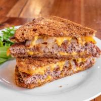 1/2 lb. Patty Melt Burger · 1/2 lb USDA prime black Angus beef patties with cheddar cheese topped with grilled onion on ...