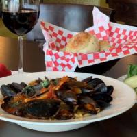 Mussels Marinara · Sauteed mussels, garlic and white wine in a light marinara sauce.