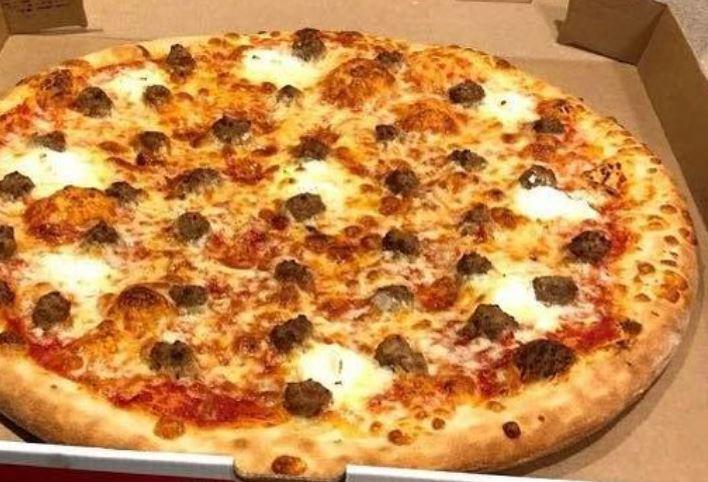 Meat Lover's Pizza · Pepperoni, Italian sausage, meatballs, ham, bacon, tomato sauce, mozzarella cheese.