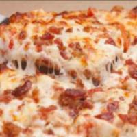 Chicken Club Pizza Thin Crust · Chicken, onions, tomatoes and bacon. Substitute Alfredo sauce by request.