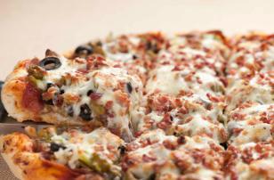 The Beast Pizza Thin Crust · Sausage, pepperoni, Canadian bacon, ground beef, mushrooms, onions, green peppers, black olives, green olives and bacon.