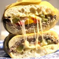 Philly Cheese-steak Sandwich · Roast beef, bell pepper, red onion and swiss cheese