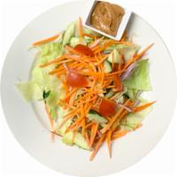 House Salad · Lettuce, carrot, tomato, red onion, cucumber, with peanut dressing