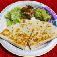 Meat Quesadilla · Meat and cheese

Extra charge for extra salsas and lime. See Sides