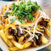 BLVD Fries · Your choice of meat on top of a bed of fries. Topped with shredded cheese, pickled carrot & ...