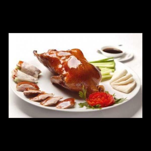 CH18. Peking Duck · Crispy BBQ Peking duck boneless with pancake wraps on side.