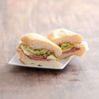 Roma Sandwich · Dry salami, Cotto salami, pepper cheese, lettuce and mild peppers, with marinara sauce spread.