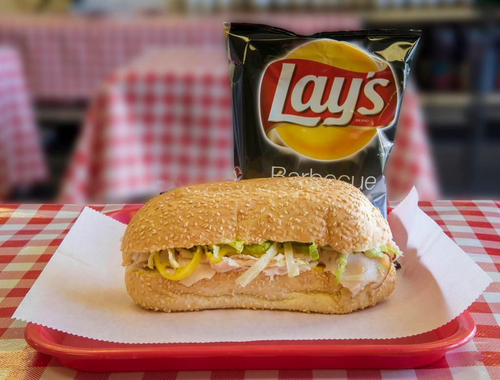 Turkey Breast Sandwich · Turkey breast (oil-browned), lettuce, mild peppers, with mustard and mayonnaise.