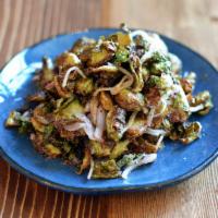 Brussels Sprouts · Tossed with pickled shallot, apple and cider vinaigrette. Vegan. Gluten-free.