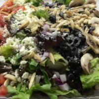 87 Special Salad · Mix greens, red onions, black olives, feta, tomatoes, mushrooms, toasted almonds, and Romano...