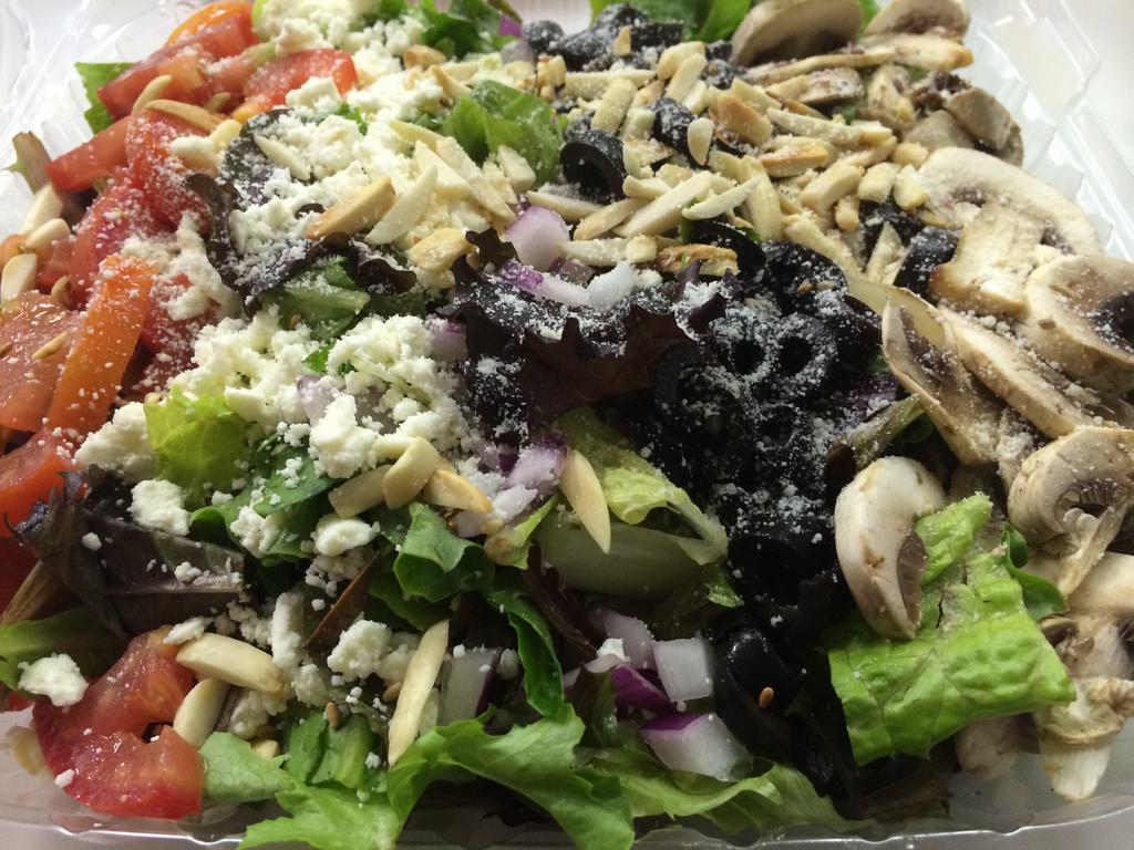 87 Special Salad · Mix greens, red onions, black olives, feta, tomatoes, mushrooms, toasted almonds, and Romano cheese.