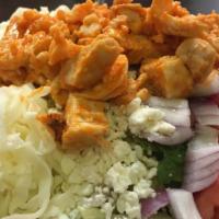 Buffalo Chicken Salad · Chicken tossed in your choice of wing sauce, romaine, red onions, tomatoes, feta, and mozzar...