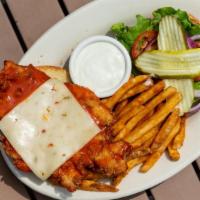 Buffalo Chicken Sandwich · Breaded chicken breast dredged in Buffalo sauce, topped with pepper-jack cheese, served on a...