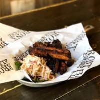 Smoked Ribs · 1/2 rack house-smoked St. Louis style ribs with either Bronx Alehouse BBQ, Carolina BBQ or j...
