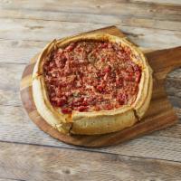 Chicago Style Deep Dish Cheese Pizza · A pan style pizza with a buttery crust loaded with cheese and topped with our chunky tomato ...
