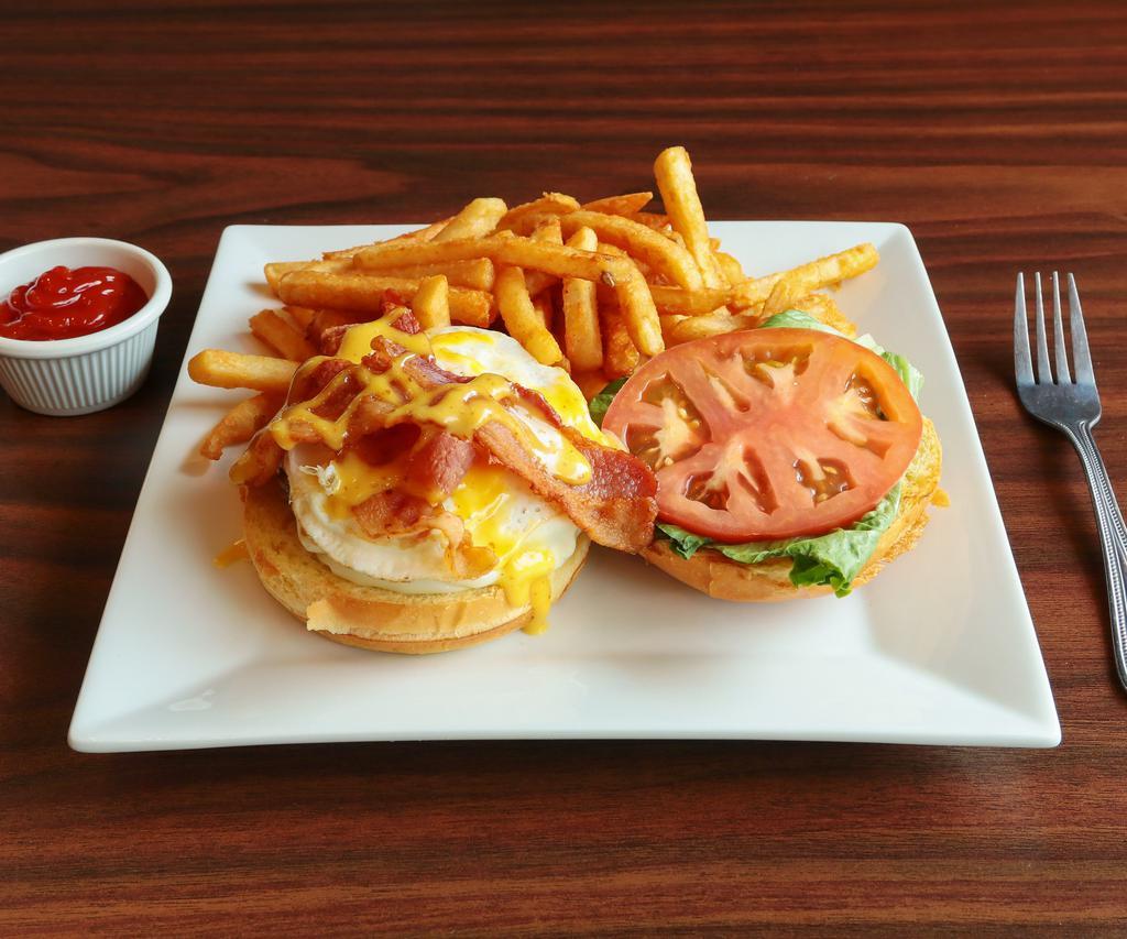 The Sibri's Burger · Fried egg, American cheese, bacon, honey mustard, lettuce, tomato and onion. Served with french fries.