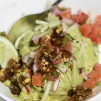 Guacamole Bowl and Chips · Mashed avocados, cilantro, lime juice, serranos, onions, cucumber, diced tomatoes. Add  ques...