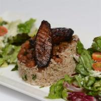 Rice Salad · Warm basmati rice tossed with choice of protein, cilantro and sherry vinaigrette, plantains,...
