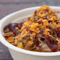 Piggy Mac · A big helpin of home made mac and cheese topped with pulled pork, tangy BBQ sauce and BBQ po...