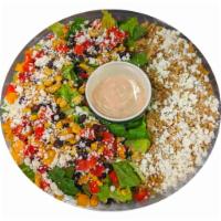 Mexicana Bowl · Romaine, basmati rice, black bean corn salsa, feta, red and yellow peppers, chipotle ranch d...