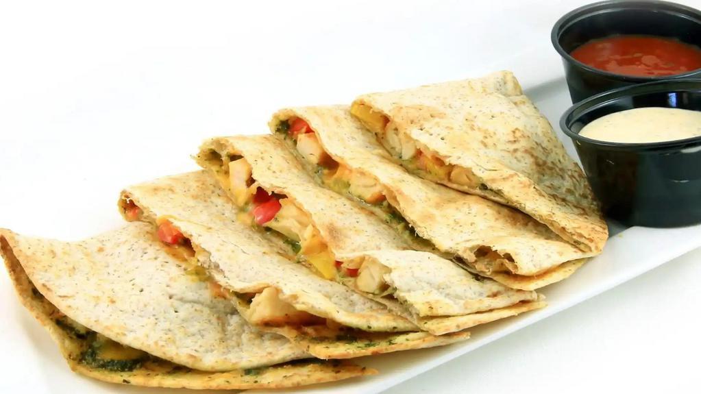 Pesto Quesadilla · Chicken, peppers, cheddar, pesto. Served with ranch and salsa.