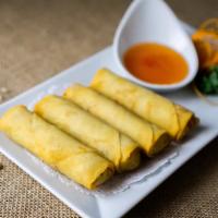 Crispy Spring Rolls (4 Pieces) · Deep fried spring roll skin filled with cabbage, sesame oil, bean thread and carrot served w...