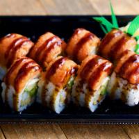 Sunrise Roll · Shrimp tempura, cream cheese, avocado topped with spicy tuna and eel sauce.
