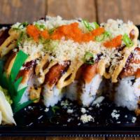 Friendly Roll · Shrimp tempura, crab salad and avocado topped with spicy tuna, eel sauce, spicy mayo, tempur...
