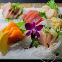 Sashimi Deluxe · 17 pieces of assorted fish. Contains raw, undercooked ingredient.