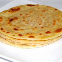 75. Paratha · Whole wheat, layered bread fried with butter.