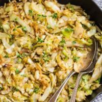 Cabbage · Succulent Fried Cabbage prepared with applewood smoked bacon