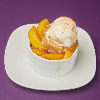 Warm Homemade Peach Cobbler · Sweet peaches in a sweet cinnamon brown sugar sauce all encompassed in a deliciously baked c...