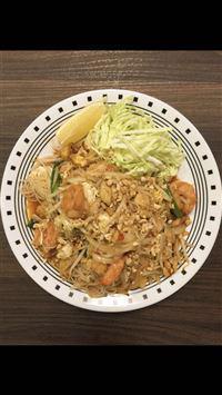 38. Pad Thai · Chicken and shrimp with pad Thai sauce topped with peanuts. Spicy.