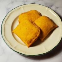 Beef Pattie · Jamaican patty filled with beef and spices with a flaky shell.