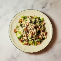 Caesar Salad · Romaine, multi grain croutons, Parmigiano reggiano and creamy Caesar salad.