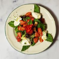 Burrata Salad · Baby spinach, mixed greens, croutons, strawberries, burrata cheese, cherry tomatoes, basil, ...