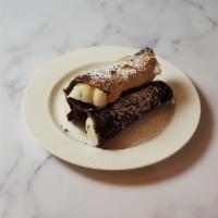 Cannoli · Half chocolate shell with cream filling and chocolate chips.
