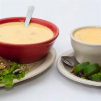 Chile con Queso · A perfect blend of 3 cheeses melted together. Served with tortilla chips and jalapenos on th...