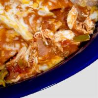 Chicken Enchiladas · 3 shredded chicken enchiladas topped with sour cream sauce and melted cheese.