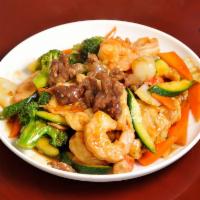 12. Happy Family · Shrimp, chicken, beef, scallop and mixed vegetables.
