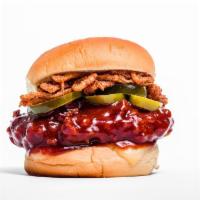 BBQ Chicken Sandwich · Topped with jack cheese, crispy shallots, and pickled jalapeños. Served on a Martin’s potato...
