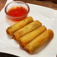 4 Piece Vegetable Egg Roll · Crispy dough filled with minced vegetables.