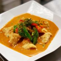 Panang Catfish · Panang curry with coconut milk, deep fried catfish, bell pepper, carrots, sweet peas and lim...