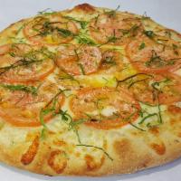 Tomato Basil Pizza · White pizza topped with fresh sliced tomato, shredded mozzarella cheese, basil and grated Pe...