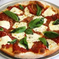 Margherita Pizza · Red tomato pie topped with garlic, fresh mozzarella cheese, basil and Pecorino Romano.
