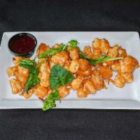 Cheese Curds · Fresh never frozen beer-battered cheese curds, cooked to order and served with our house-mad...
