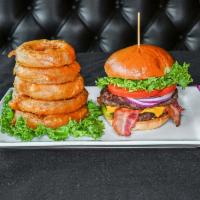 Monster Burger · A classic. We put Wisconsin cheddar and hickory smoked bacon between 2 flame-grilled Angus b...