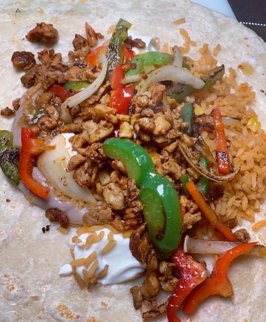 Fajita Burrito · Grilled bell peppers, onions, rice, beans, salsa, sour cream and choice of meat wrapped in a flour tortilla.